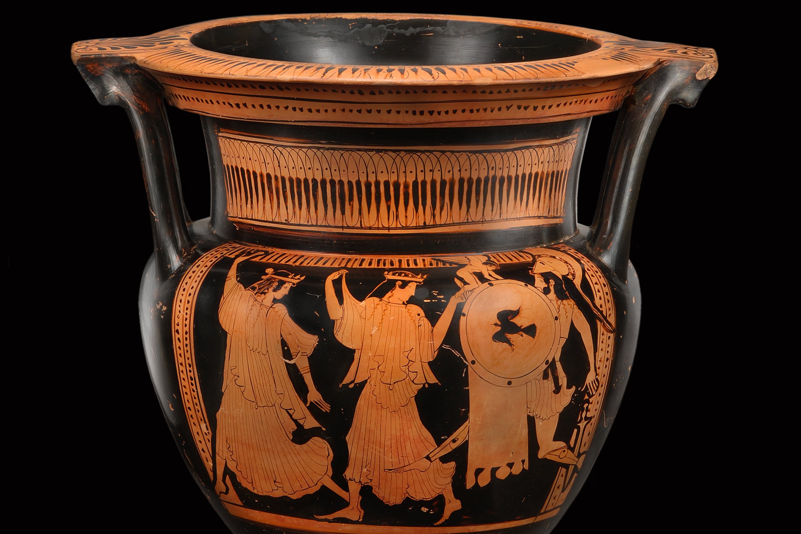 Mixing vessel, red figures against black background, depicting two female figures running left, while turning their heads around to their backs, where an armed male figure is following them; a winged boy figure turns against the warrior and touches his shield