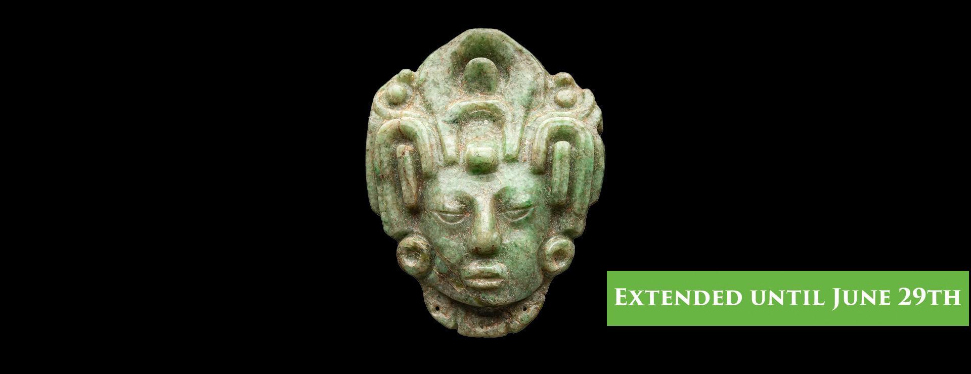 Central green jade head of a maize god against black background, green rectangle with white lettering "extended until June 29th"