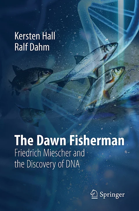 Dunkelblaues Buchcover mit Bild eines Fischschwarzms und einer stilisierten Doppelhelix im Hintergrund; oben Nennung der Autoren Kersten Hall und Ralf Dahm, unten der Titel "The Dawn Fisherman" und Untertitel "Friedrich Miescher and the Discovery of DNA".