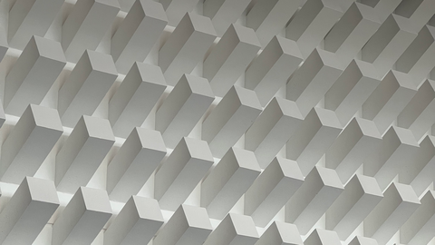 Großflächiges Betonrelief aus schräg nach oben aus der Wand ragenden Betonpfeilern, rasterartig angeordnet, im Foyer des Hörsaalzentrums der Universität Tübingen auf der Morgenstelle