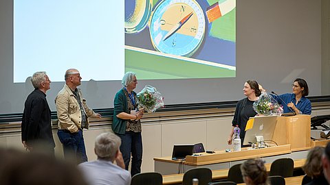 © MUT | Fabian Kurze Zu sehen sind mehrere Leute des Organisationsteams bei der Verabschiedung am letzten Tagungstag