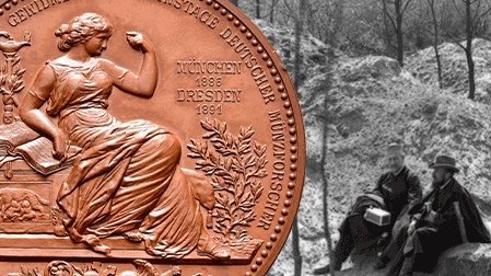 On the left a copper coin with a seated, anciently clothed female figure, on the right a section of a black-and-white picture of two men seated on a bench