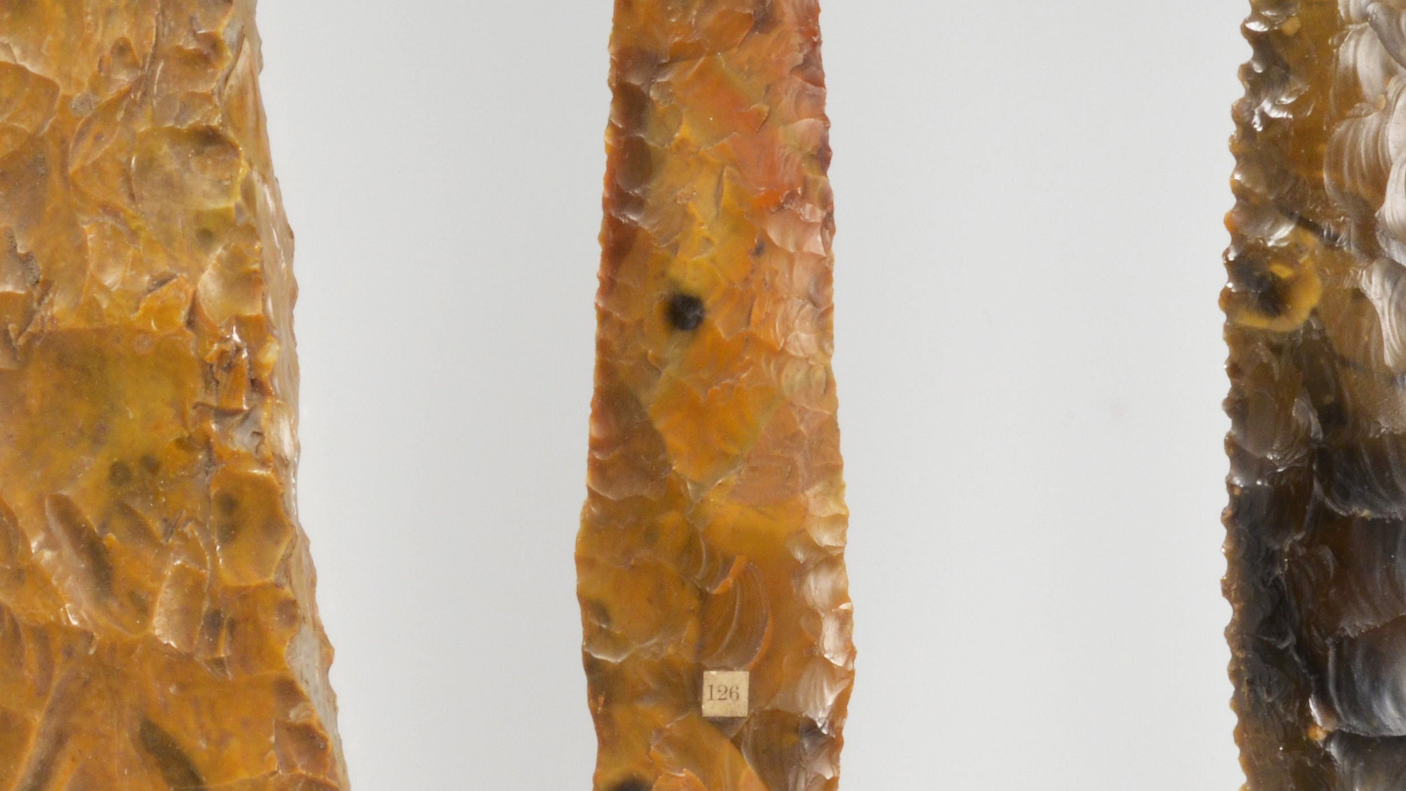 Three elongated pieces of hewn flint