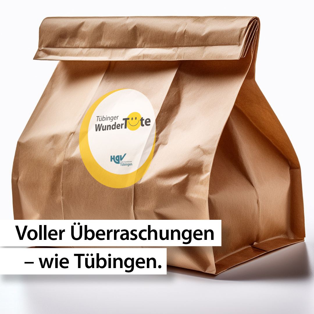 Papiertüte mit einem Aufkleber, auf dem stent: "Tübinger Wundertüte"