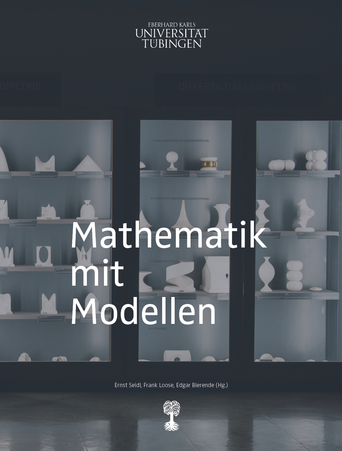 Cover "Mathematik mit Modellen" against an illuminated showcase with colourless mathematical models